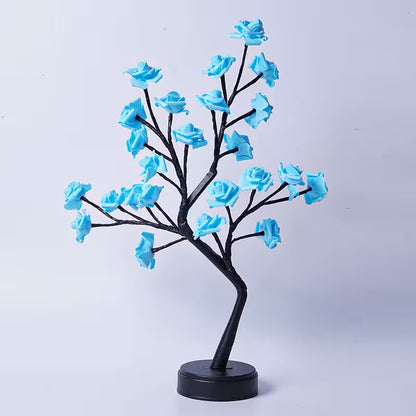 Decorative tree with blue flowers on a white background