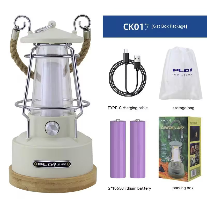Camping lantern with accessories including batteries, charging cable, storage bag, and packaging box.