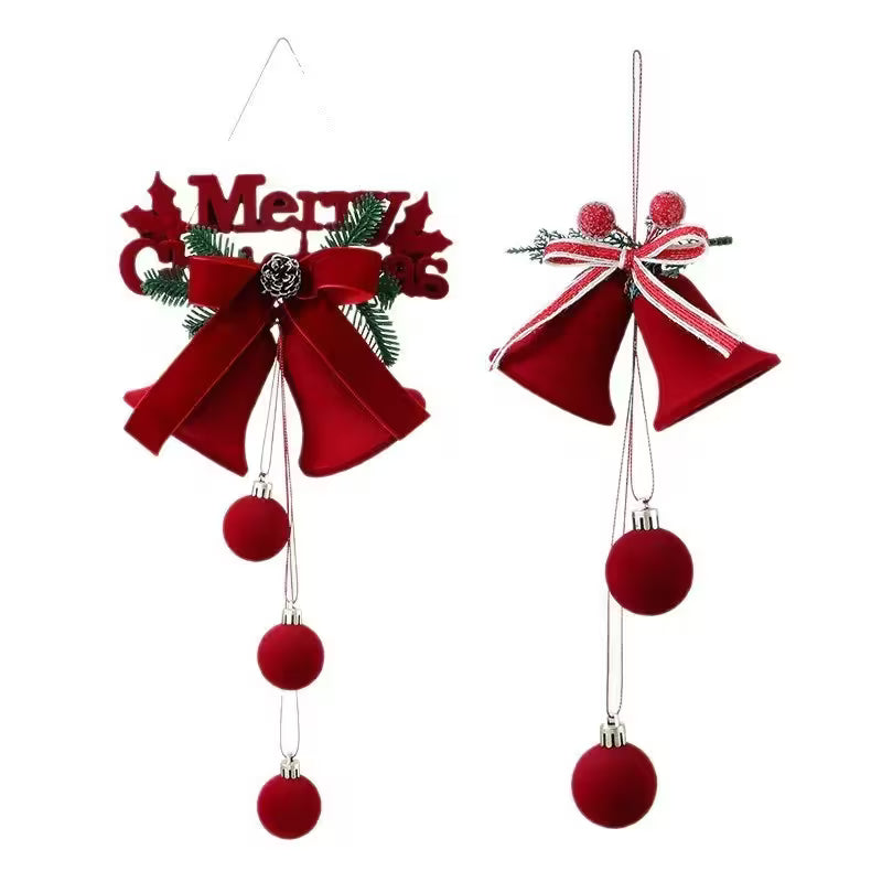 Red Christmas decorations with bells and balls on a white background
