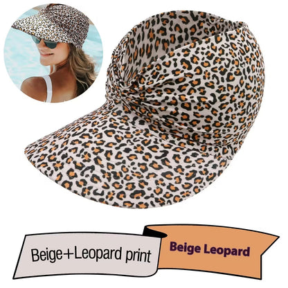 Leopard print visor hat with a model wearing it inset on a white background
