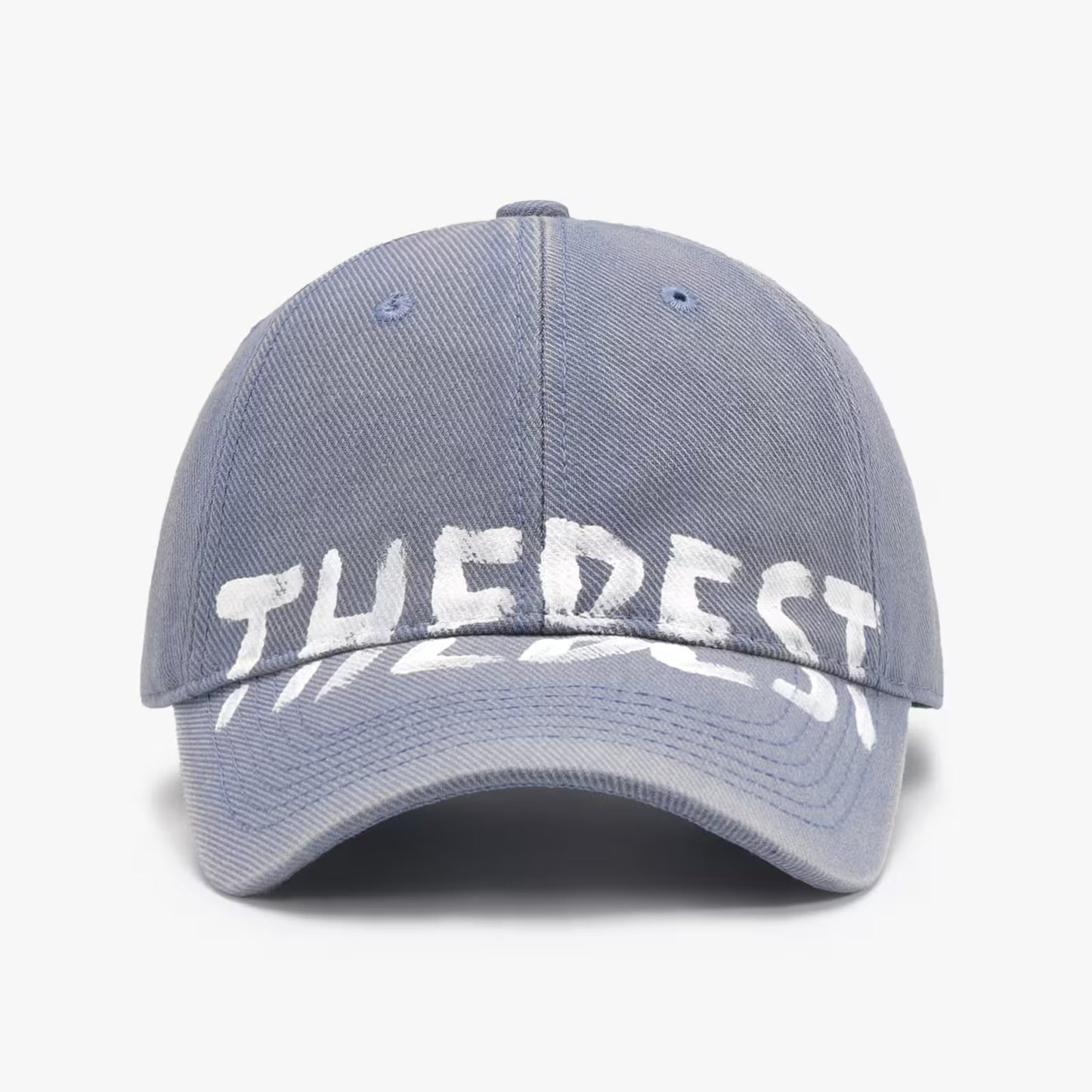 Gray cap with 'THE BEST' text on a white background