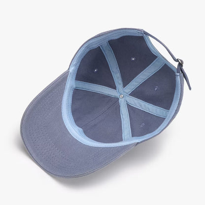 Blue baseball cap on a white background