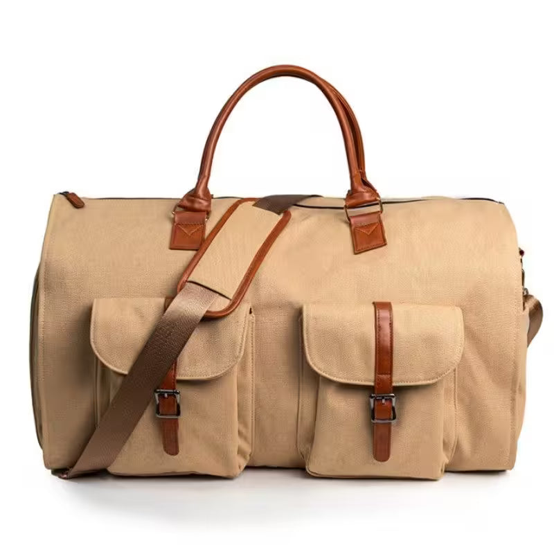 Beige duffel bag with brown leather straps on a white background