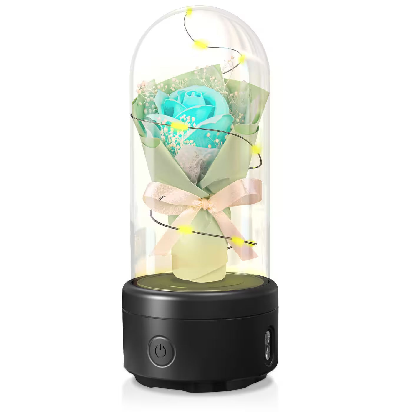 Decorative lamp with a turquoise rose inside a glass dome on a white background