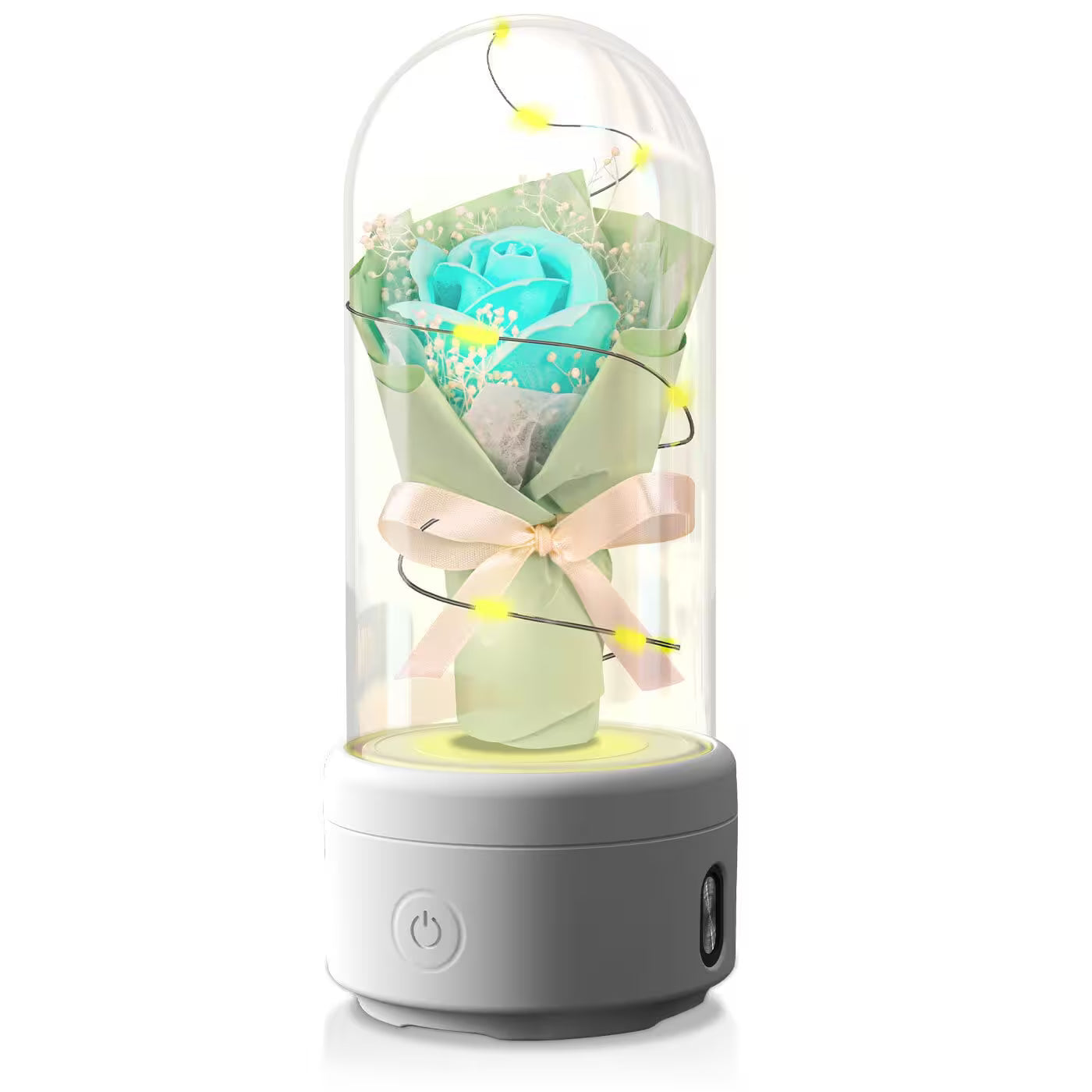 Decorative lamp with a turquoise rose inside a glass dome on a white background