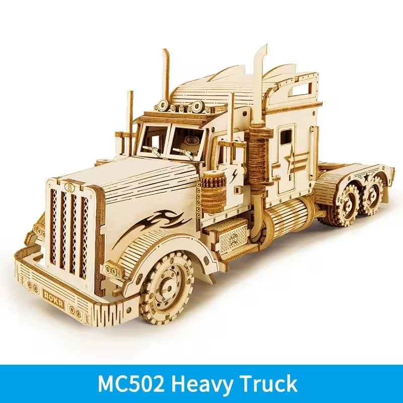 Wooden model of a heavy truck with 'MC502 Heavy Truck' text on a white background