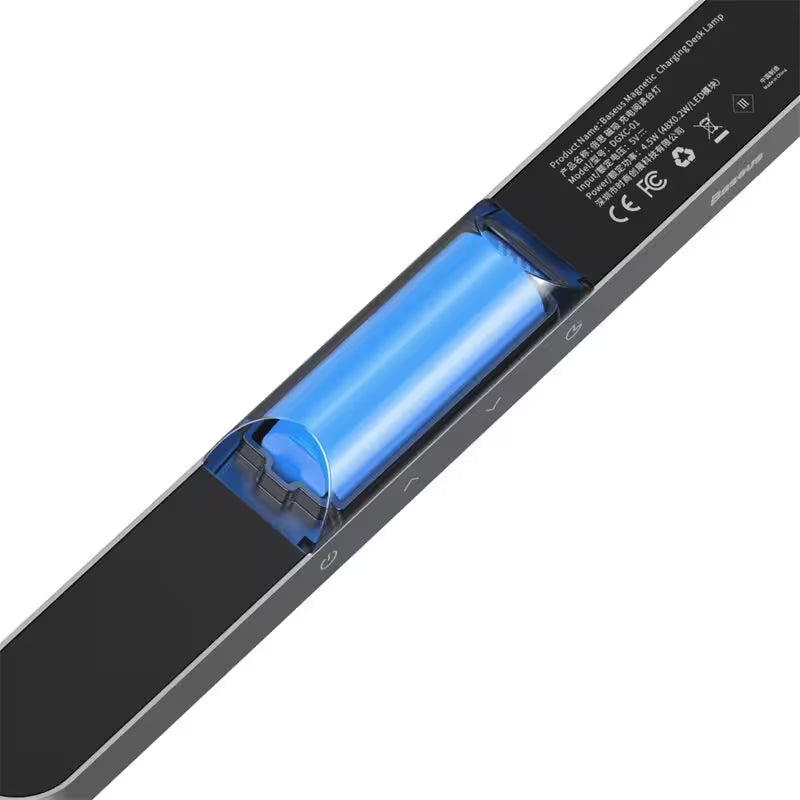 Close-up of a battery with blue interior on a white background