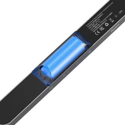 Close-up of a battery with blue interior on a white background