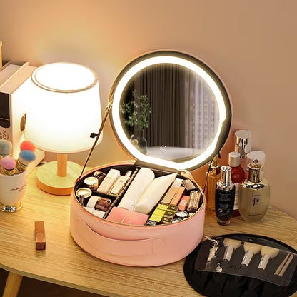 Makeup station with a round mirror, makeup products, and a lamp on a wooden table.