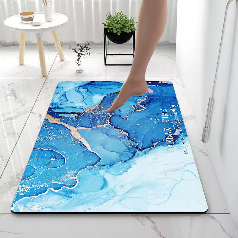 Blue marbled rug with gold accents on a marble floor