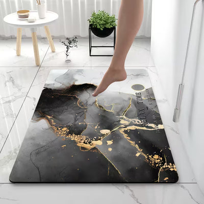 Decorative black and gold rug on a marble floor with a person stepping onto it.