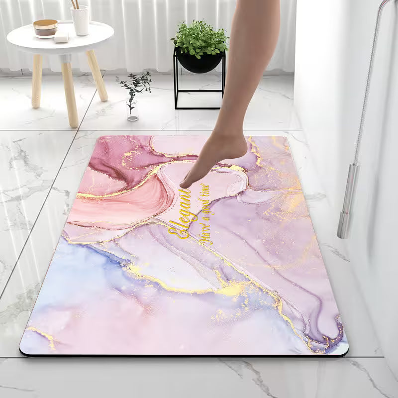 Marble-patterned mat with gold accents on a marble floor