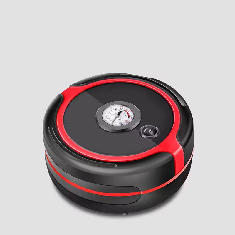 Black and red circular device with a gauge on a gray background