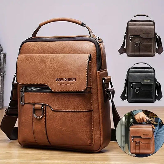 Brown leather shoulder bag with visible brand logo on a wooden surface.