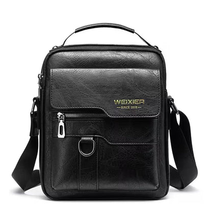 Black leather crossbody bag with visible brand logo on a white background