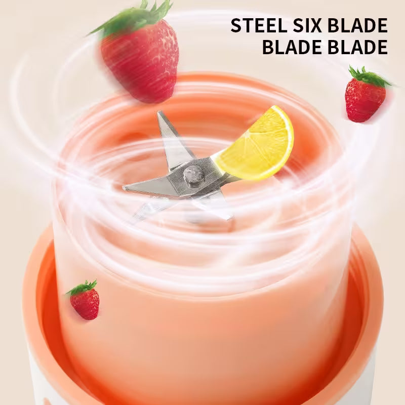 Blender with a steel six blade and fruit slices on a beige background
