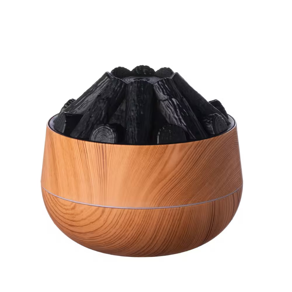 Wooden fire pit with black logs on a white background