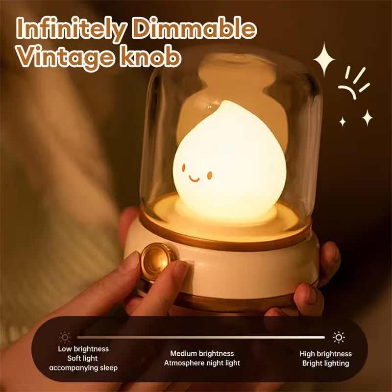 Vintage-style night light with dimmable knob held by a hand, glowing softly.
