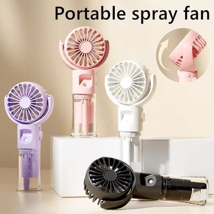 Portable spray fans in various colors on a light background