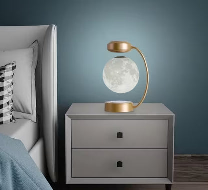 Decorative lamp on a nightstand next to a bed with a blue wall background