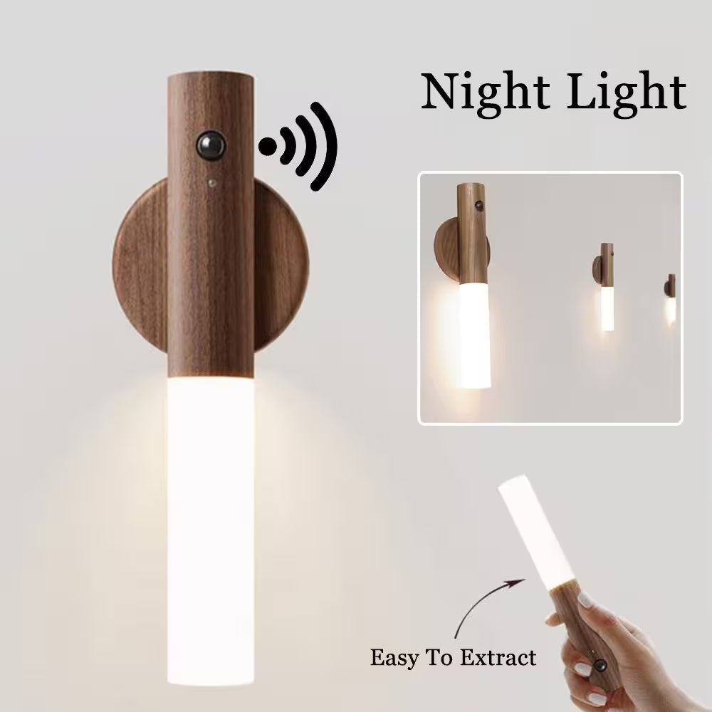 Wooden night light with a hand holding a similar product, on a light gray background.