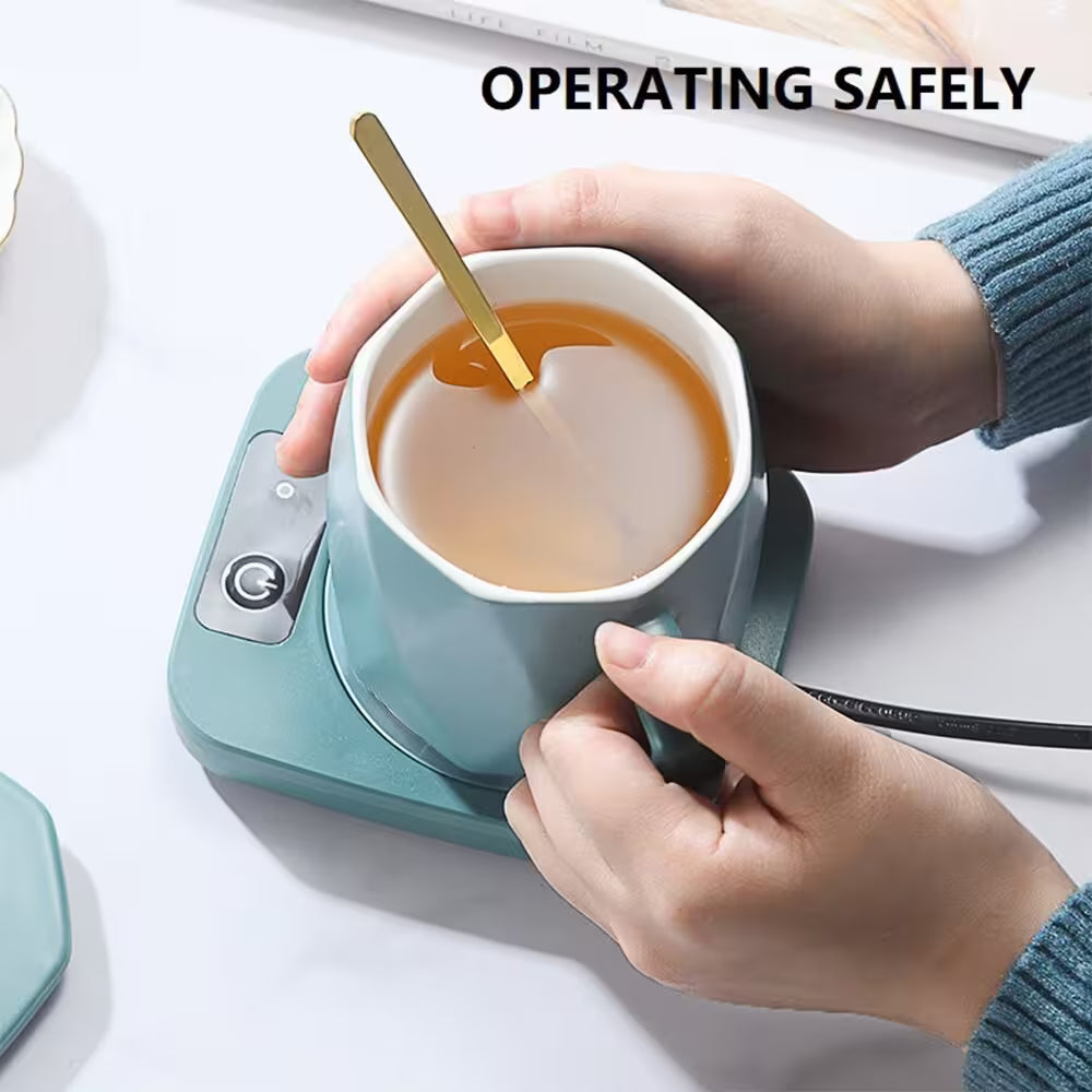 Person using a teal electric mug with a white background and text 'OPERATING SAFELY'.