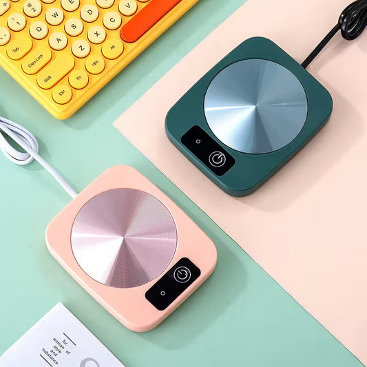 Two small round devices with metallic tops on a colorful background