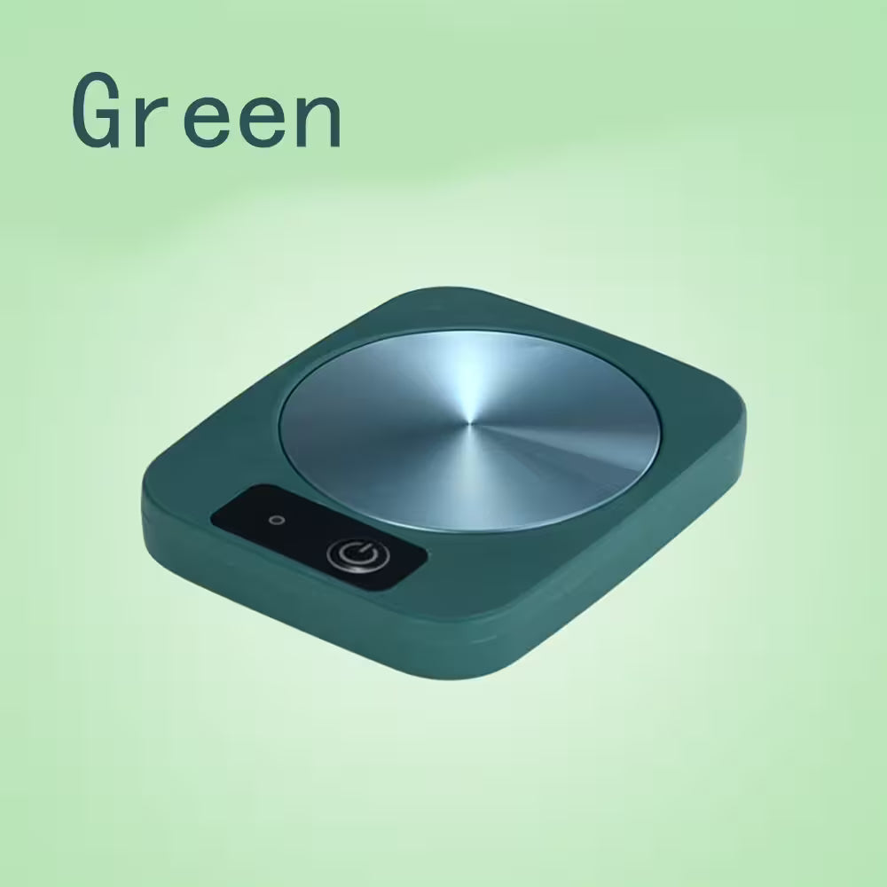 Green hot pot with metallic surface on a green background