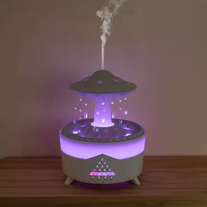 UFO-shaped humidifier emitting mist on a wooden surface with a dark background