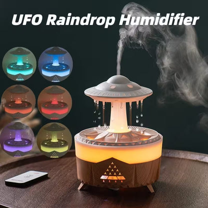 UFO raindrop humidifier with colorful light display on a dark background