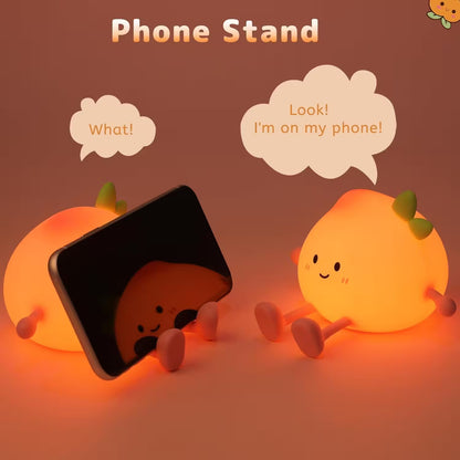 Phone stand with cartoon characters on a brown background