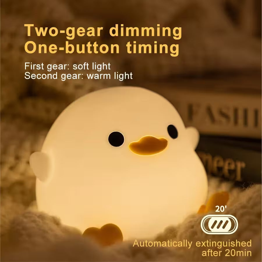 Cute duck-shaped night light with two-gear dimming and one-button timing features on a soft background.
