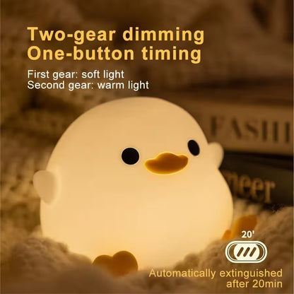 Cute duck-shaped night light with two-gear dimming and one-button timing features on a soft background.