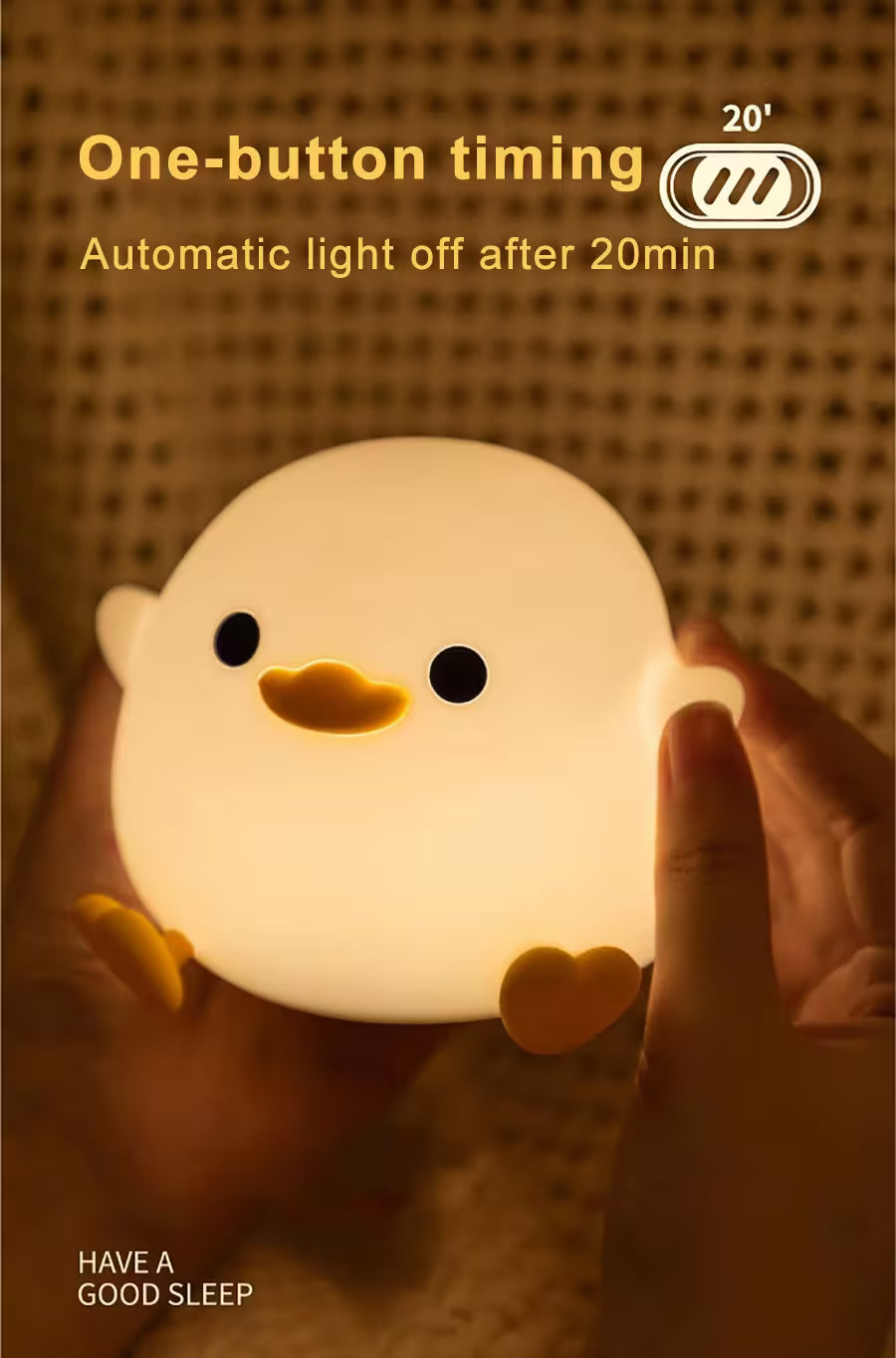 Light-up duck-shaped night light held by a hand with text about one-button timing and automatic off feature.