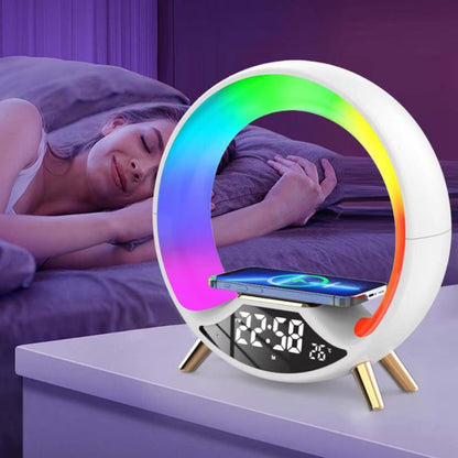 Multicolored LED night light with digital display on a stand, showing time and temperature.