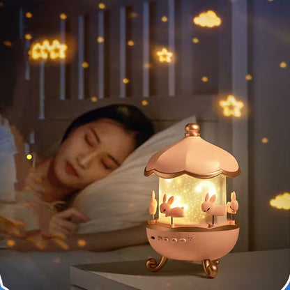 Woman sleeping with a decorative lamp featuring rabbits on a nightstand.