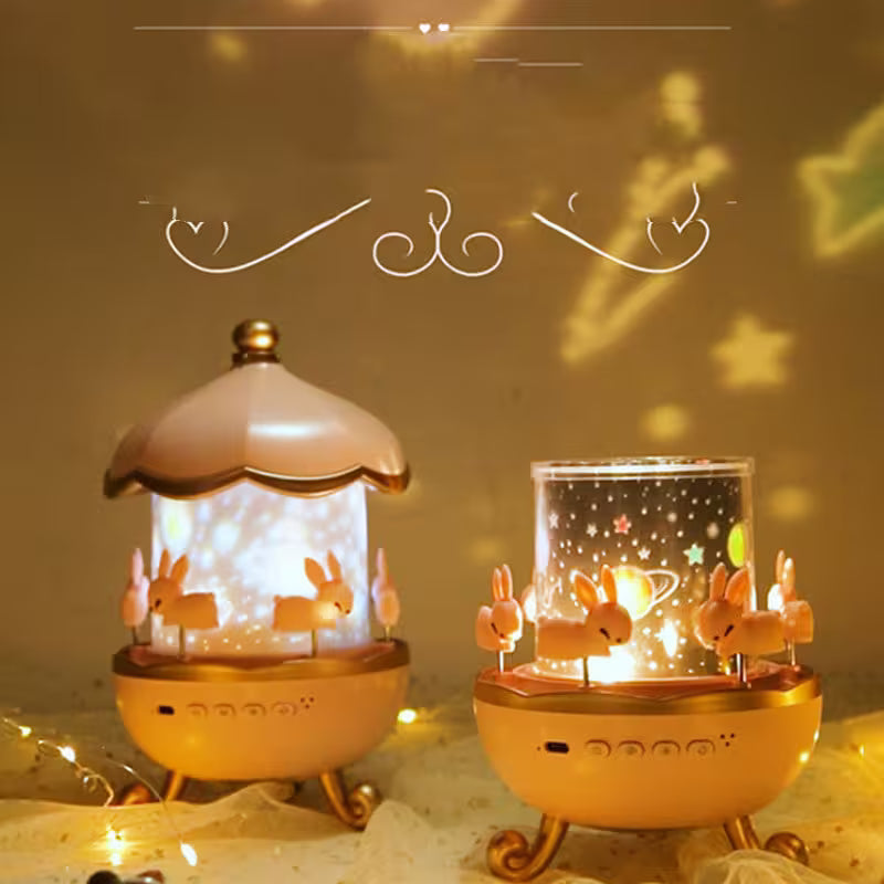 Two decorative night lights with rabbit designs on a warm, glowing background.