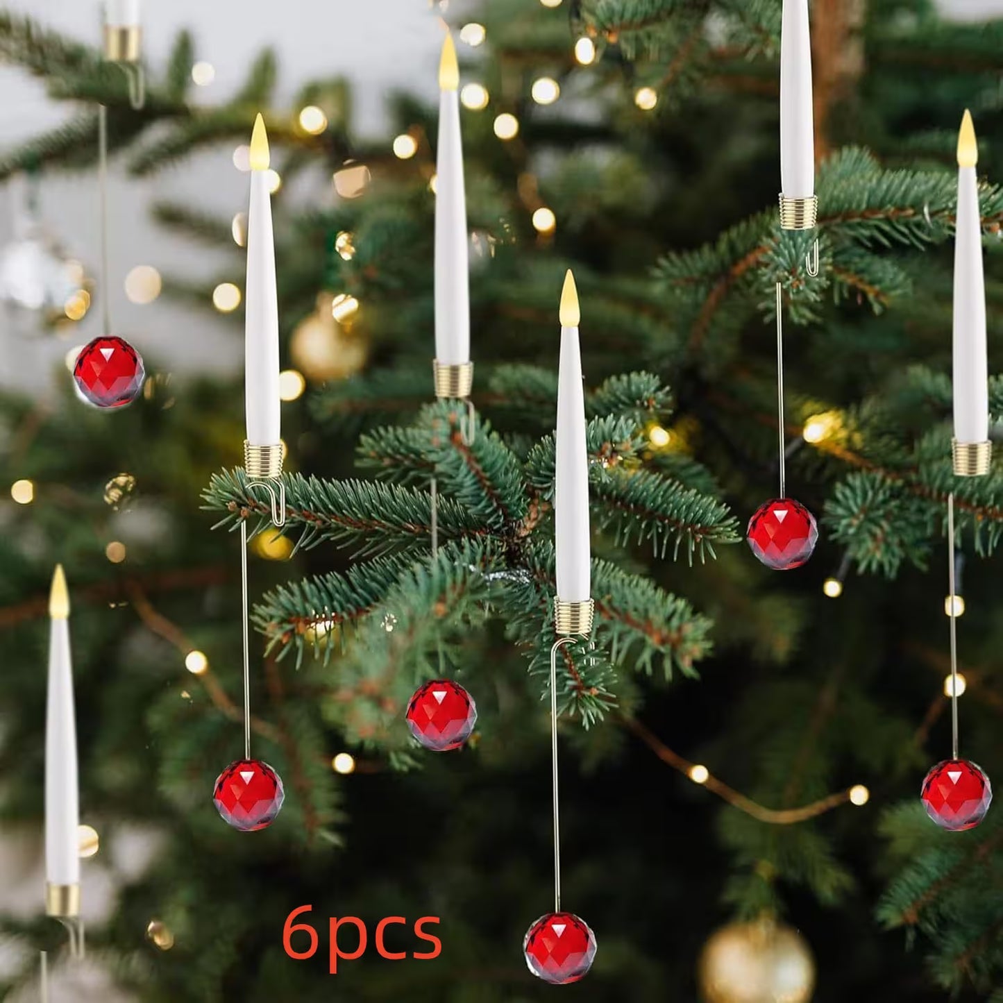 Decorative Christmas tree lights with red balls and white candles on a blurred Christmas tree background.