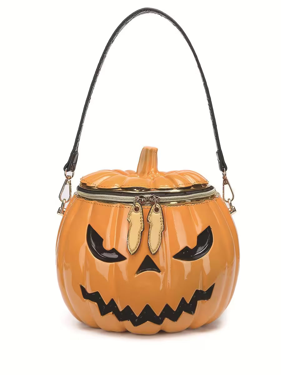 Pumpkin-shaped handbag with a face design on a white background