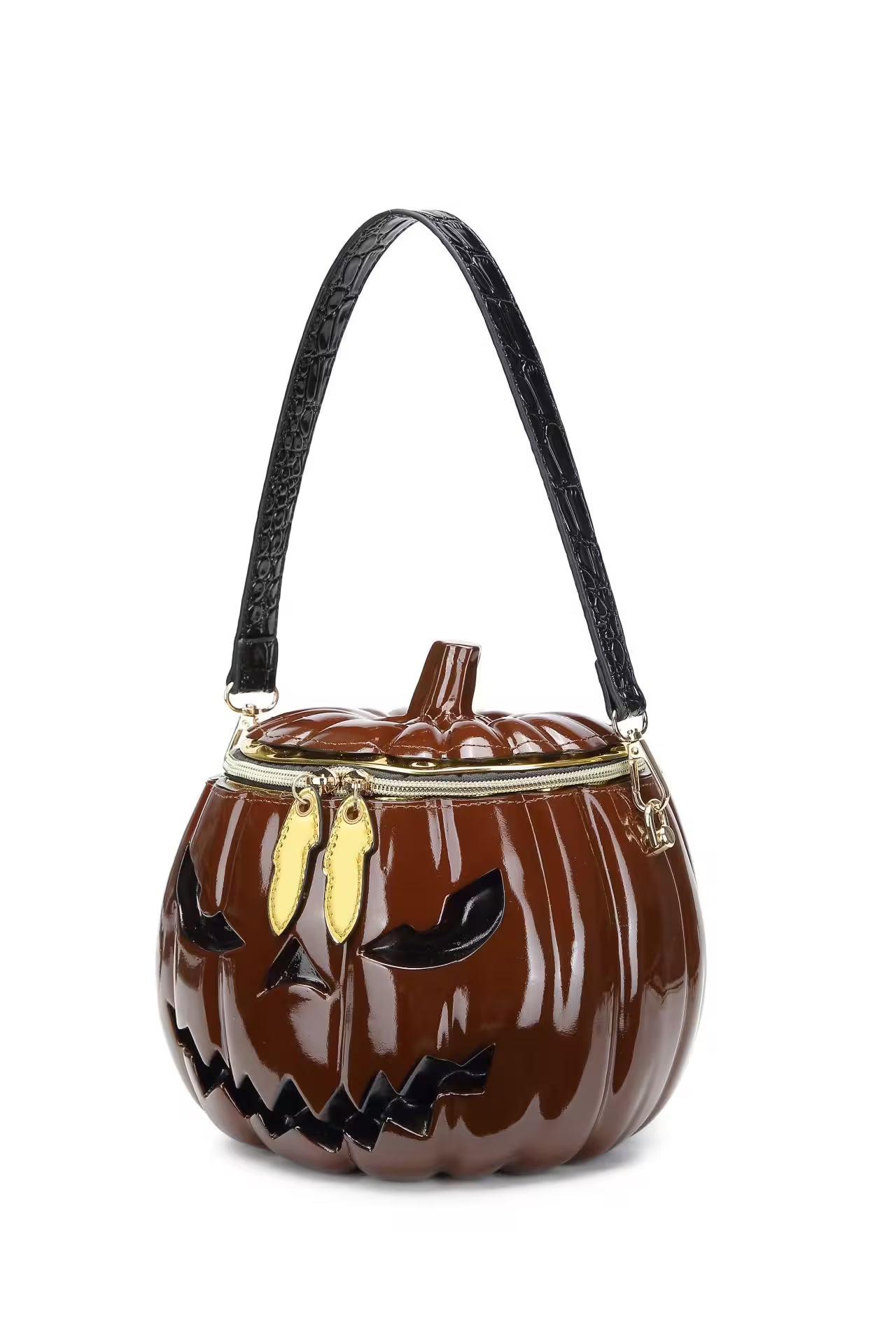 Halloween-themed pumpkin purse with a black handle on a white background