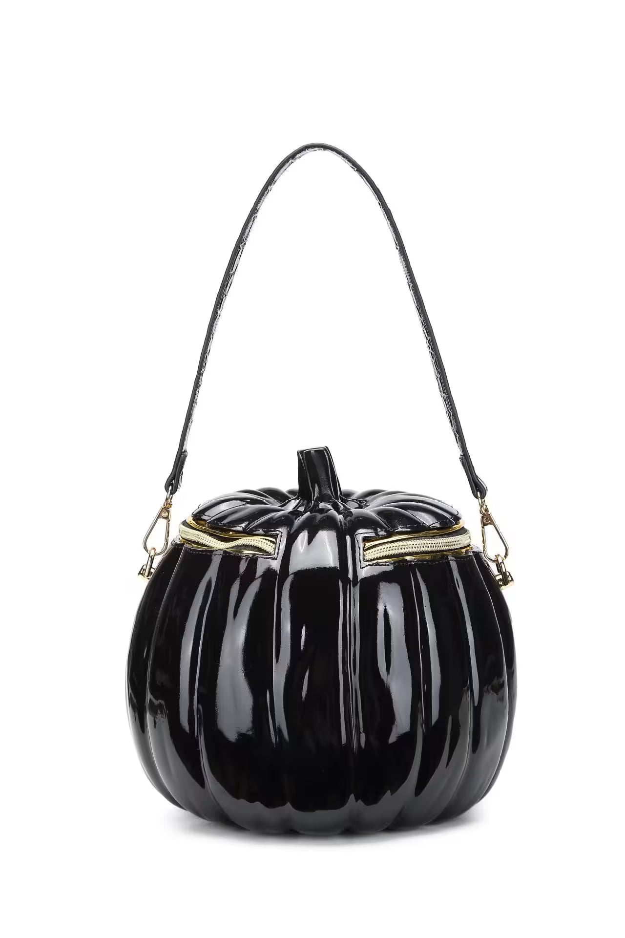 Black pumpkin-shaped handbag with gold accents on a white background
