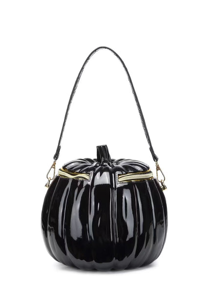 Black pumpkin-shaped handbag with gold accents on a white background