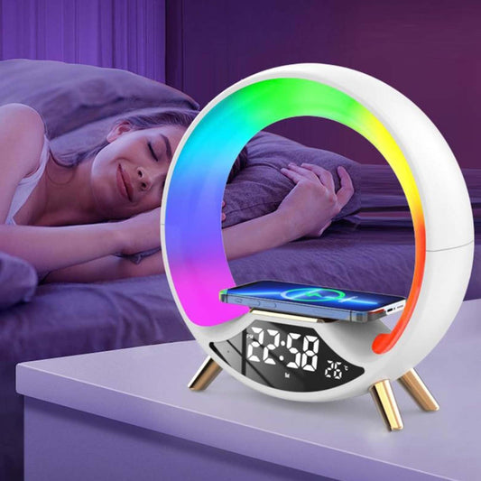 Multicolored LED night light with digital display on a bedside table, showing a person sleeping in the background.