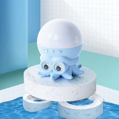 Blue octopus-shaped water toy on a marble platform with water below