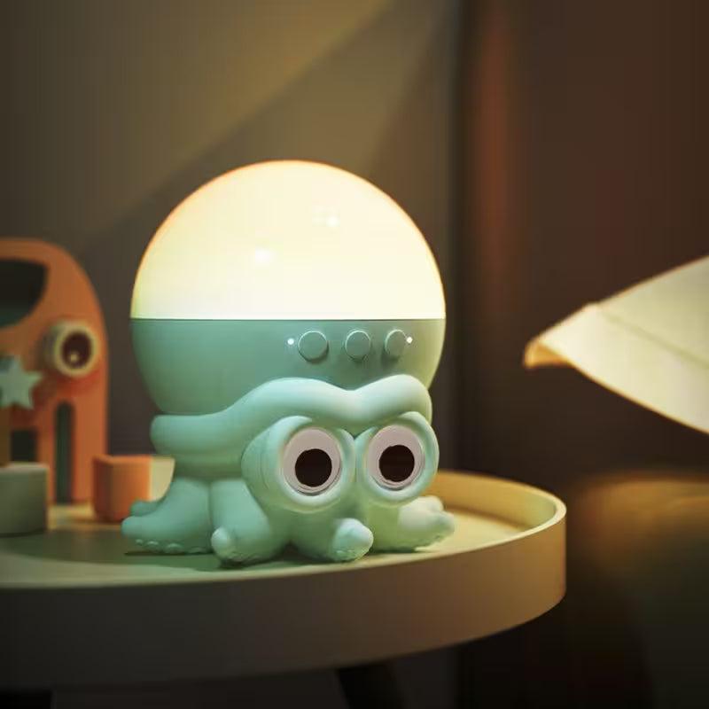 Cute green octopus-shaped night light on a table with a warm glow