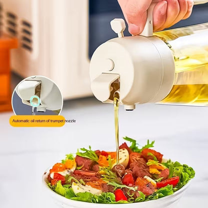 Oil dispenser pouring oil onto a salad with close-up detail of the nozzle.
