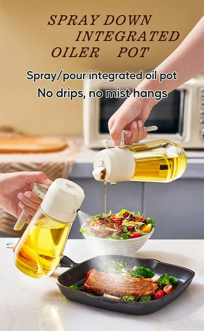 Spray oil pot being used to pour oil onto a salad and pan of food on a kitchen counter.