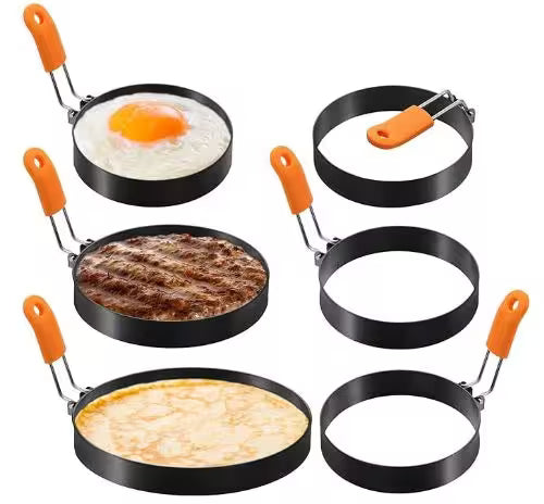 Set of pancake rings with orange handles on a white background