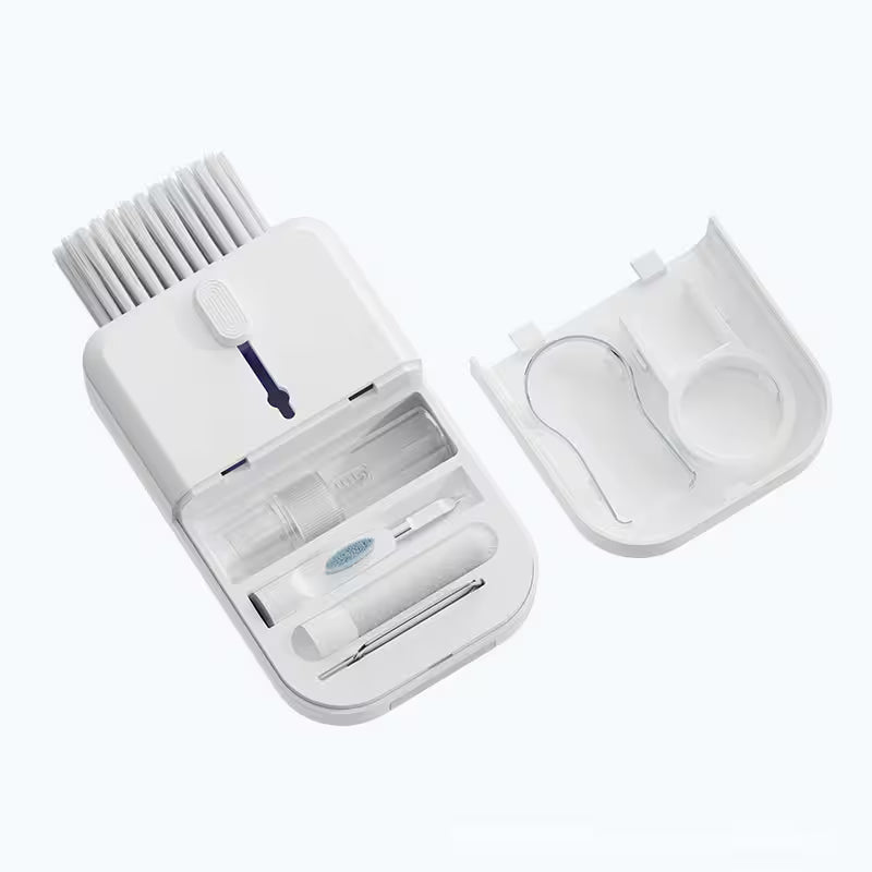 White electronic device with brush attachment on a white background