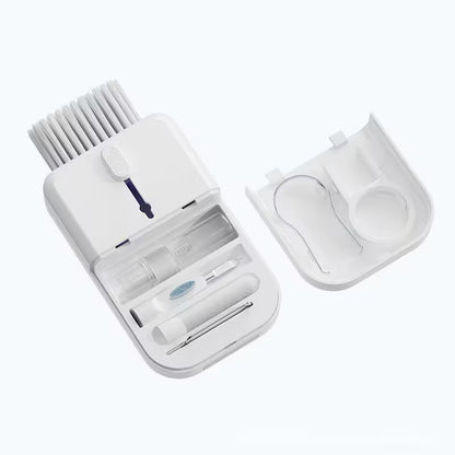 White electronic device with brush attachment on a white background